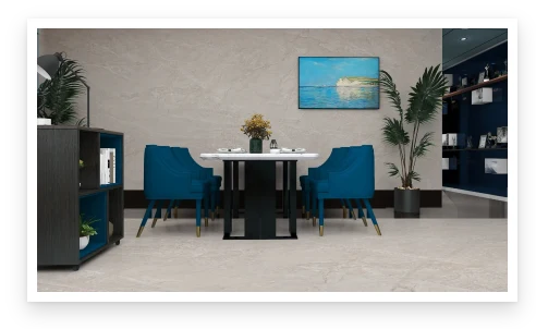 A dining room with deep blue chairs on a warm stone-look Letoza floor