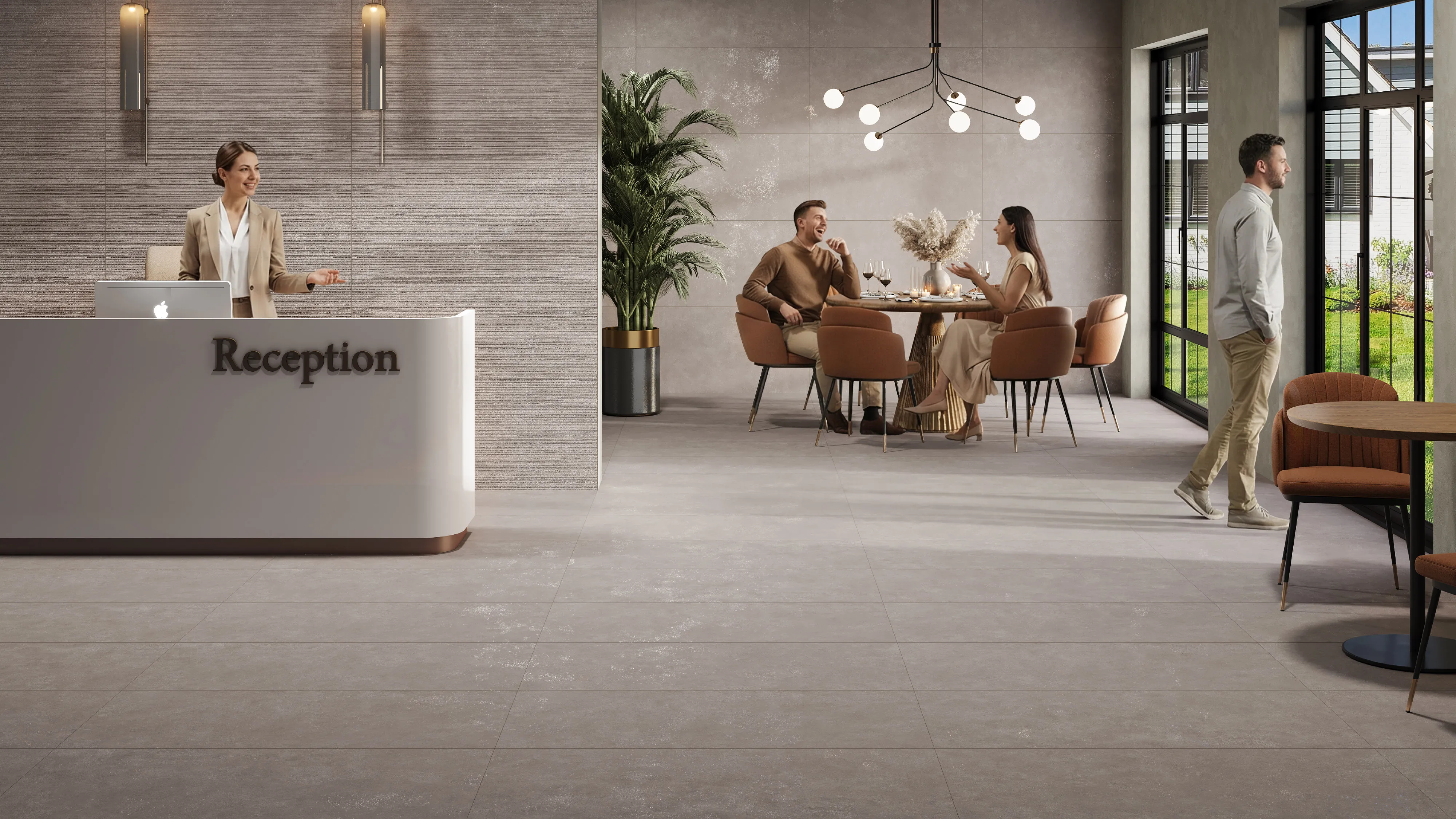 A hotel reception and lounge area finished in large-format Letoza tiles, with guests seated at a dining table and garden views beyond